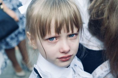 Little girl crying, doesn't want to go to school