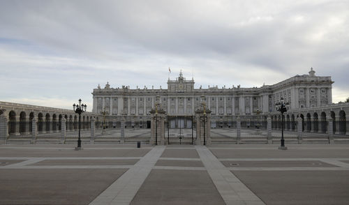 View of royal palace in madrid, spain, against cloudy sky