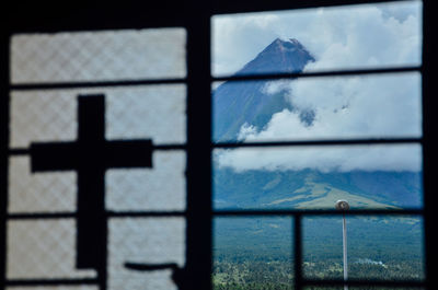 Scenic view of sea against sky seen through window