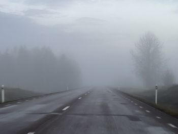 Empty road against sky