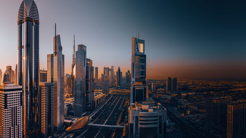High angle view of city at dawn, sunrise at sheikh zayed road, dubai