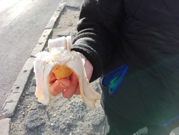 Close-up of hands holding ice cream