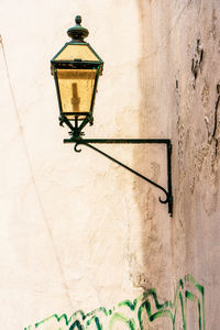 Old lantern on a house facade