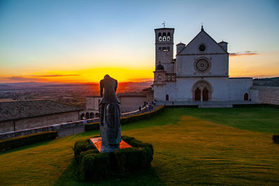 View of historical building against sky during sunset