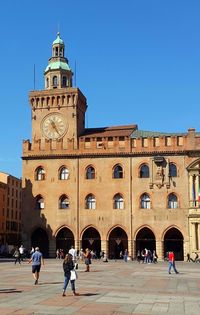 Group of people in front of building