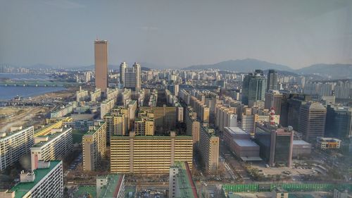 High angle view of 63 building in city against sky