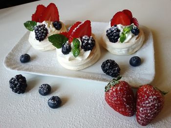 Close-up of strawberries served on table