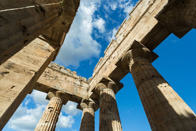 Low angle view of old temple against sky