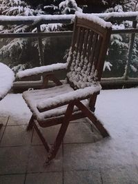 Close-up of bench in winter