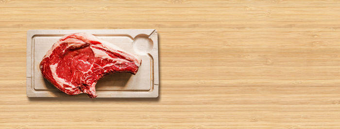 High angle view of bread on cutting board