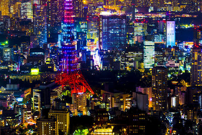 Illuminated buildings in city at night