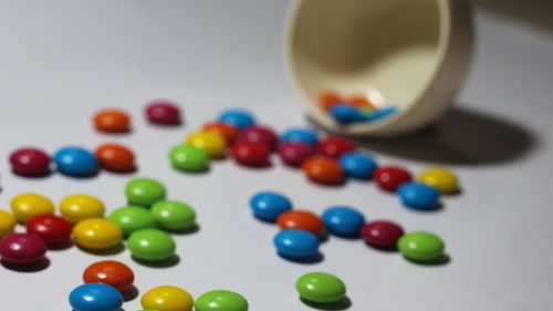 Close-up of multi colored balls on table