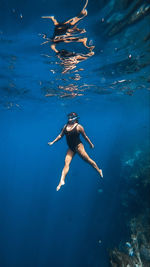 Man swimming in sea