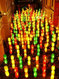 Illuminated lanterns in temple at night
