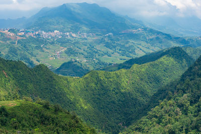 Aerial view of landscape and mountains against sky