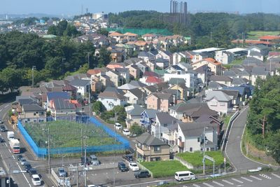 High angle view of street amidst buildings in city