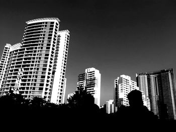 Low angle view of skyscrapers against sky