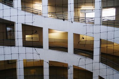 Building reflecting in water