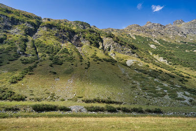 Scenic view of land against sky