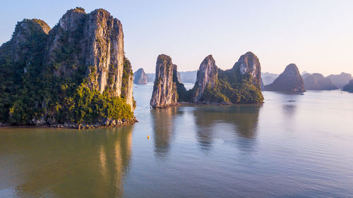 Panoramic view of rock formations against sky