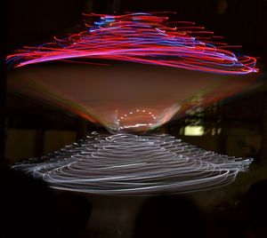 Close-up of illuminated light painting on table
