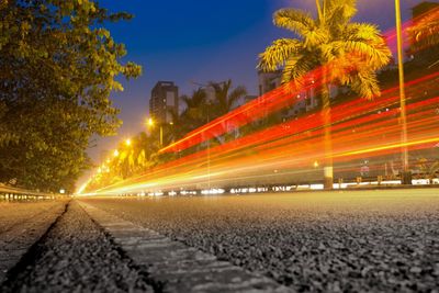 Light trails on city street at night