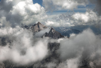 Mountain peaks were drowned in clouds