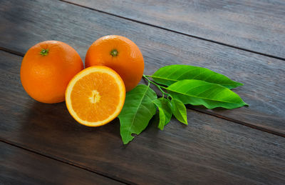 High angle view of fresh oranges on table