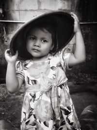 Portrait of cute girl wearing hat