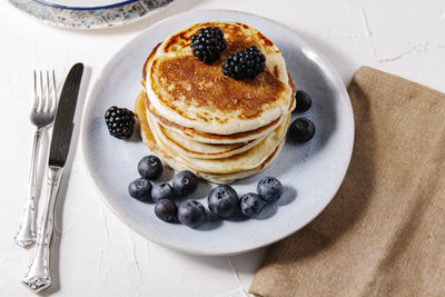 Stack of homemade pancakes on a plate