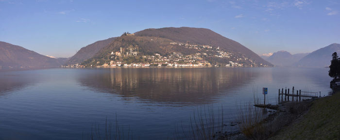 View of lake with mountain range in background