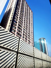 Low angle view of skyscraper against clear sky