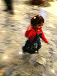 High angle view of girl jumping