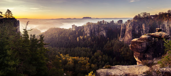 Scenic view of mountains against sky during sunset