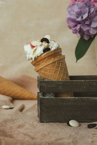 Cropped hand of woman holding bouquet
