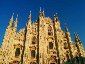 Low angle view of historical building against clear sky