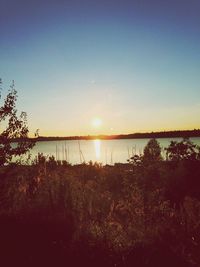 Scenic view of sea at sunset