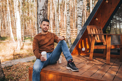 Man sitting in a forest