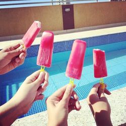 Cropped hand holding ice cream