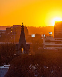 Church against sky during sunset