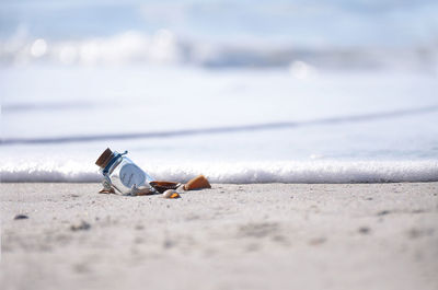 Garbage on sand at beach