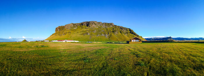 Landscape with mountain range in background