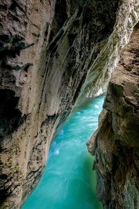 High angle view of canyon flowing amidst rock formations