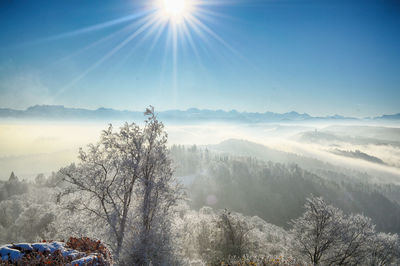 Scenic view of snowcapped mountains against clear sky