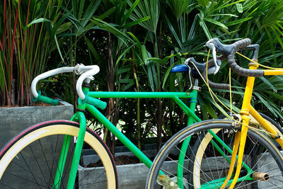 Close-up of bicycle wheel on field