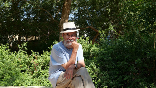 Retired senior man sitting in a park 