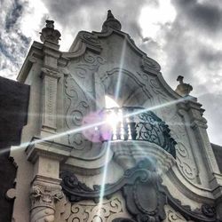 Low angle view of statue against sky