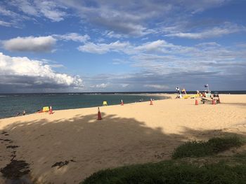 Scenic view of beach against sky
