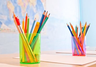 Close-up of multi colored pencils on table