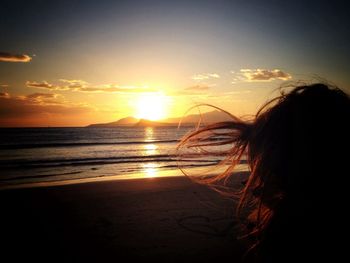 Scenic view of sea at sunset